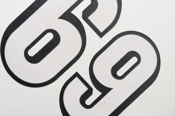 fabric sports jersey numbers six and nine 