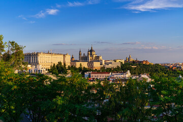 Fototapeta na wymiar Beautiful views of the Almudena Cathedral and the Royal Palace at sunset. Photography made in Madrid, Spain.
