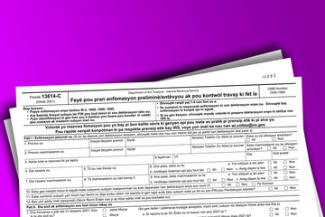 Form 13614-C (ht) documentation published IRS USA 44266. American tax document on colored