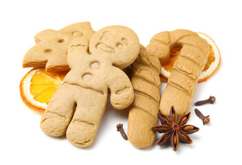 Different tasty cookies and spices on white background