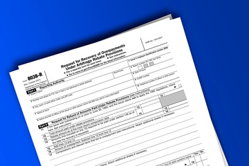 Form 8038-R documentation published IRS USA 10.14.2021. American tax document on colored