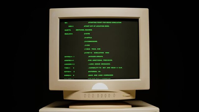 Retro pc with loading code console, programmer making scripts, green basic screen, Old computer studio close-up, Desktop vintage retro wave display, late 90s PC.