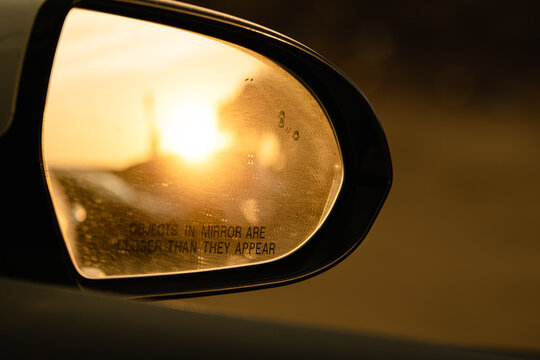 A Sunset In A Sideview Mirror 