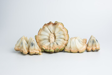 sugar apple ( srikaya ) with black spots, isolated on a white background, sugar apple fruit tastes...