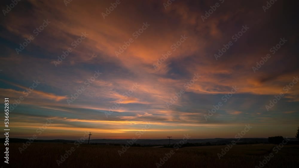 Poster timelapse of sunrise dawn on a summer field