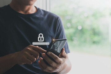 Business Technology Security Concept. Asian businessman using the smart mobile phone to access on...