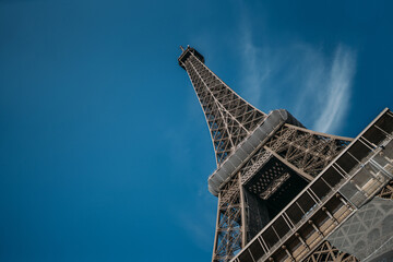 Beautiful close-up of the Eiffel Tower with blue sky at day, Paris, France.
