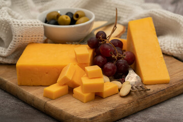 Cheddar cheese with grapes
