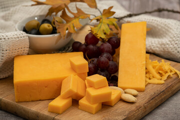 Cheddar cheese with grapes