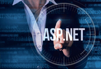 Business Woman with finger pressing asp.net programming language button on virtual screens. Modern technology concept
