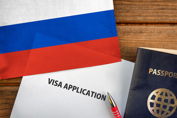 Visa application form, passport and flag of  Russia