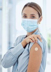 Woman with plaster on arm from covid vaccine and mask, medical injection and corona virus for...