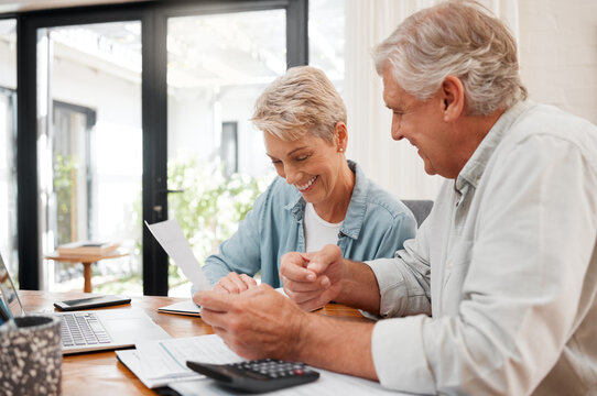 Senior couple, finance and investment or paying their bills at home. Married man and woman use calculator, checking their budget and retirement plan. Smiling mature people planning for future pension