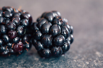 Macro shot of ripe blackberries, natural background.