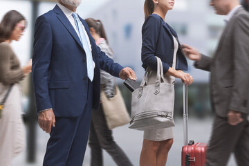 Thief pickpocketing in the city street