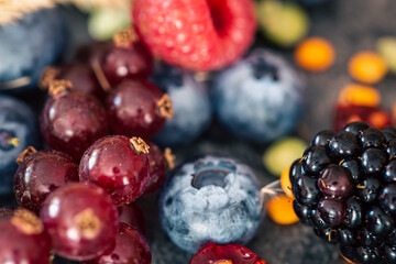 Natural background with different wild berries, macro shot.