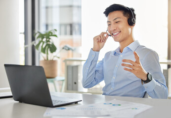 Customer service, call center and telemarketing with an asian man consultant working on a laptop with a headset. Contact us, crm and consulting with a male working in his sales office with a smile