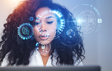 African businesswoman with laptop and biometric scanning, digital hologram