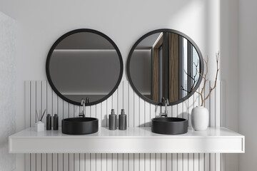 Light bathroom interior with washbasin and window, accessories