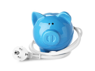 Blue piggy bank and power plug on white background. Energy saving concept