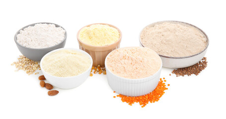 Different types of flour in bowls on white background
