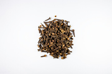 Pile of organic fresh whole clove buds isolated on white background. close up.top view.