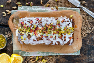 Pistachio, cardamom and lemon drizzle cake
