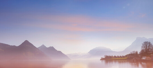 The landscape view with sunrise in the mountains as lake in Switzerland