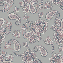 Floral seamless pattern with paisley ornament. Vector illustration in asian textile style