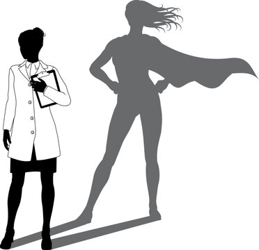 A superhero female scientist, engineer, doctor or teacher in a lab white coat woman. Revealed by her shadow silhouette as a super hero in a cape.