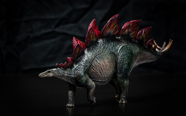 Obraz premium dinosaur , Stegosaurus in the dark