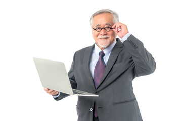 Asian senior businessman , senior man , old man wear glasses using laptop computer , smiling feel happy isolated on white background , concept for senior business success