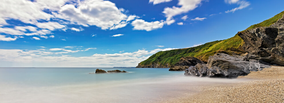 Background image, Cornwall coast in England, long exposure