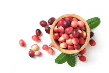Flat lay of Carissa carandas (Karanda ,Carunda, Karonda, Koromcha) fruits on white background.
