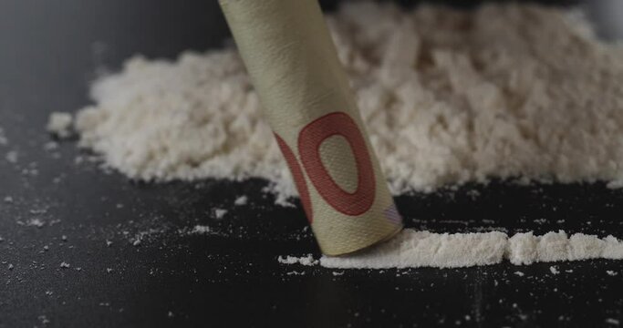 use white cocaine powder closeup, drug amphetamine. High quality 4k footage