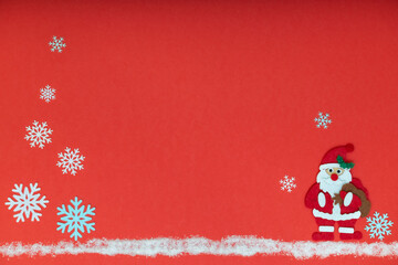 santa claus with gifts on red background