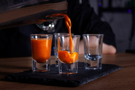 Luxury alcoholic cocktails shots with edibe glitter.