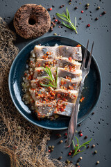Fresh and tasty pickled herring as mediterranean snack.