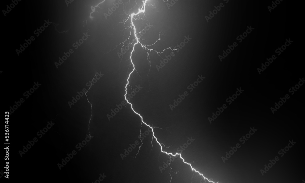 Wall mural lightning effect on black background. thunderbolt with rays of light. thunderstorm natural phenomeno
