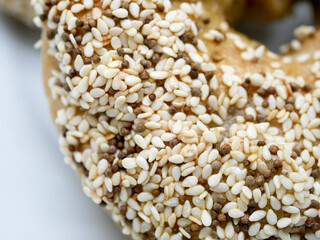 Homemade Bagels with multi grains such as sesame, perilla seeds and pumpkin seeds with white background
