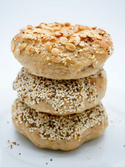 Homemade Bagels with multi grains such as sesame, perilla seeds and pumpkin seeds with white background