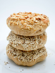 Homemade Bagels with multi grains such as sesame, perilla seeds and pumpkin seeds with white background