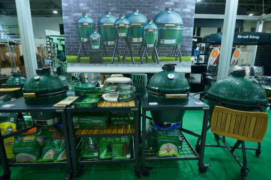 Ceramic grills made by Big Green Egg presented on stand. Exhibition. Kyiv, Ukraine