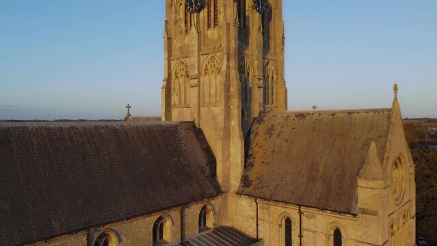 Drone filmed at sunset. St Augustine's Church. Church of England parish church located in Hedon, East Riding of Yorkshire. 