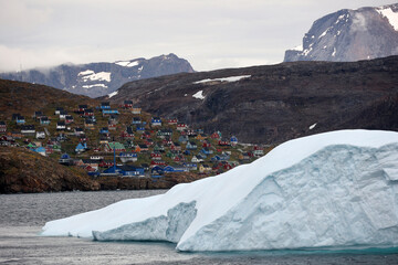 Coastal view with iceberg of Upernavik village, Greenland, Denmark © bummi100
