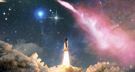 Shuttle launch in the clouds to outer space. Dark space with stars on background.Spaceship flight....
