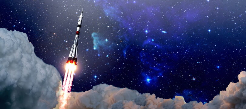 shuttle launch in the clouds to outer space. Dark space with stars on background.Spaceship flight. Elements of this image furnished by NASA