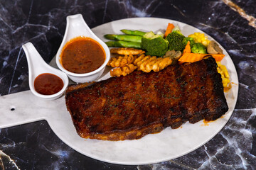 Grilled Pork Ribs with Spicy Dipping Sauce and Vegetable Salad