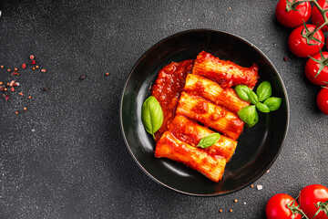 cannelloni pasta dish stuffed with meat tomato sauce healthy meal food snack diet on the table copy space food background rustic top view