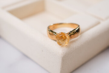 gold ring and citrine rose shape ring